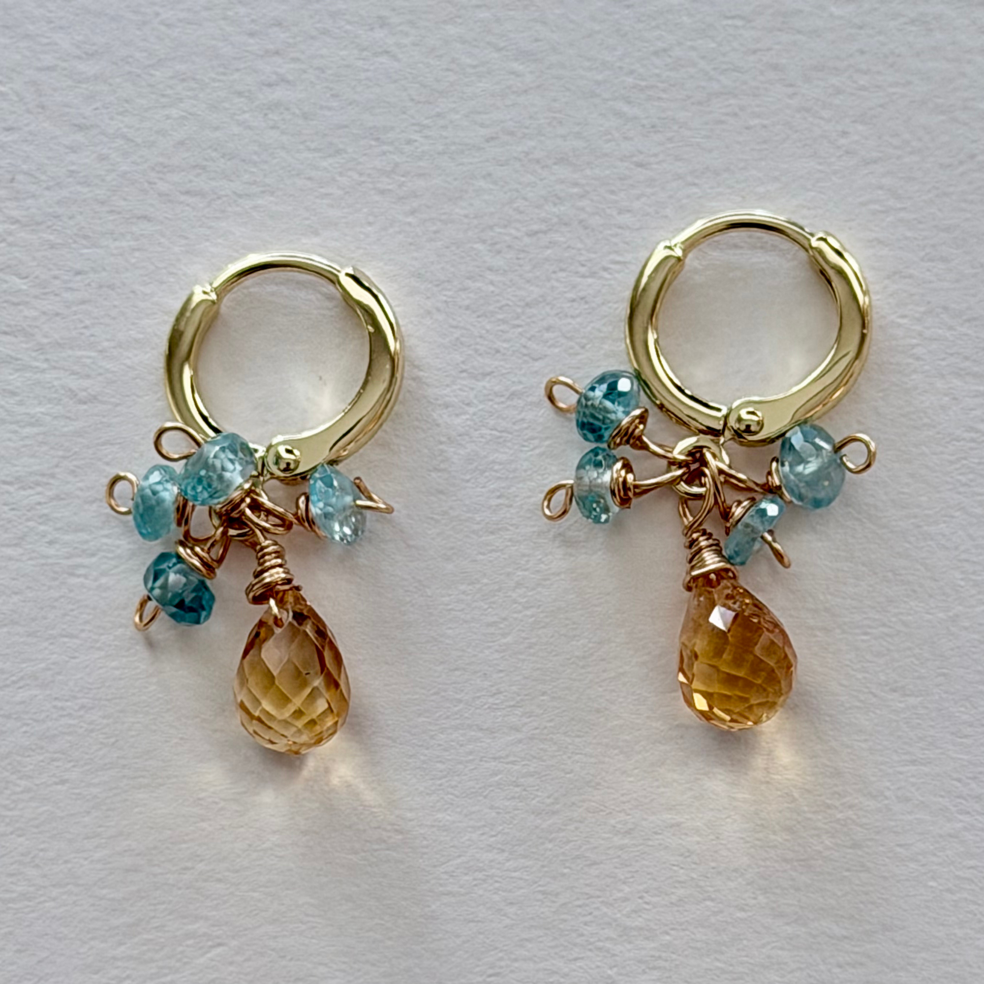14k Gold filled hoop handmade earrings with mystic topaz and citrine beads on a light gray background