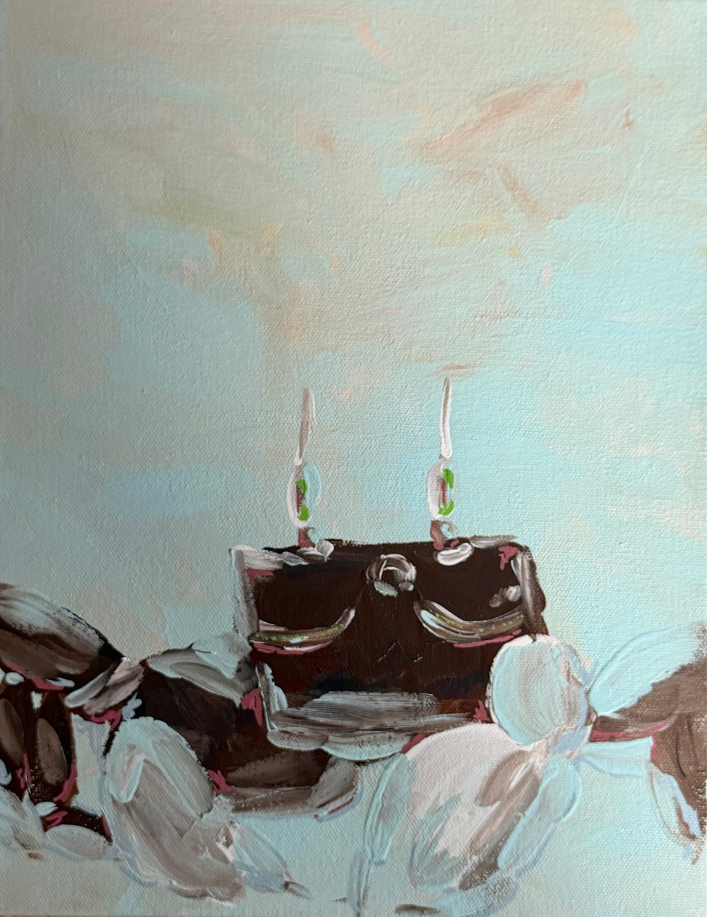 An abstract painting depicting a dark brown rectangular crab with two small white and green candle-like shapes on top, surrounded by soft white and gray brushstrokes against a pale blue background.