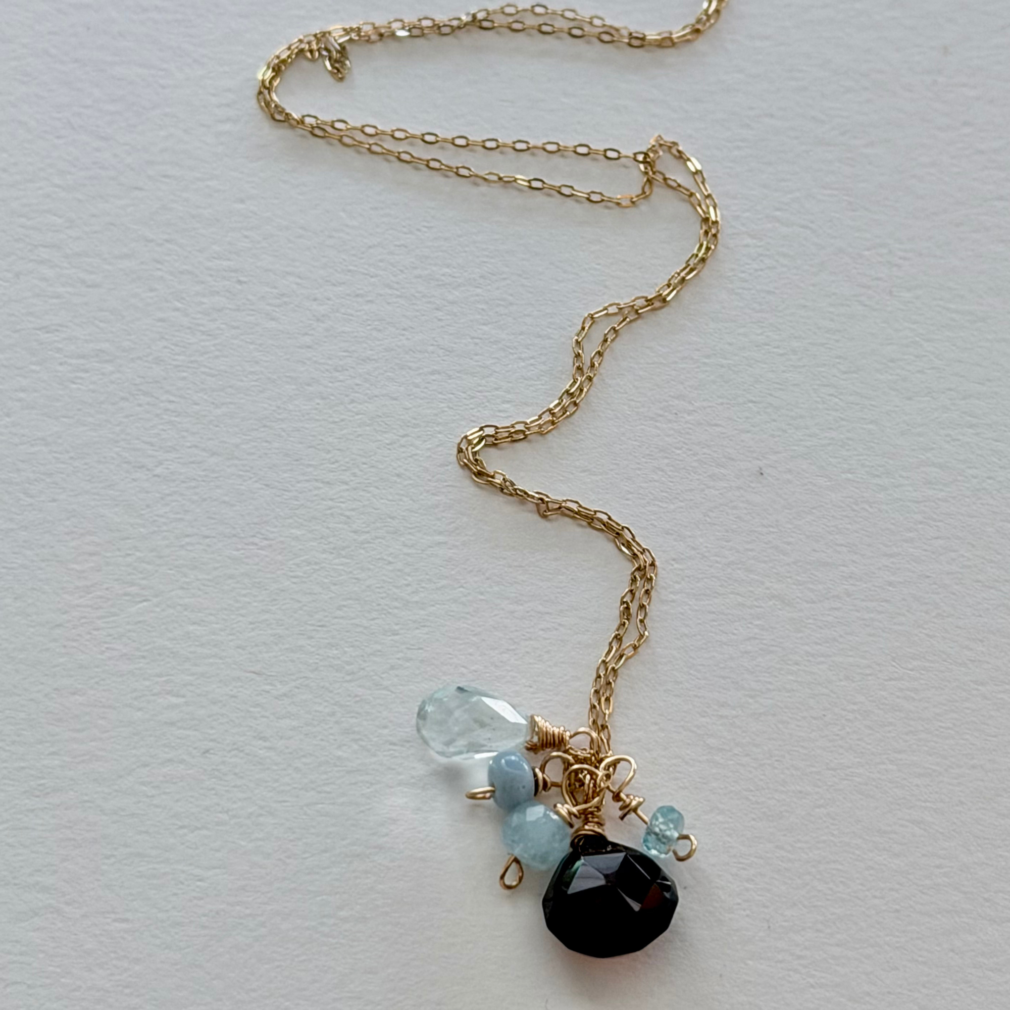 14k Gold filled necklace with chocalate chalcedony  pendants on a light gray background