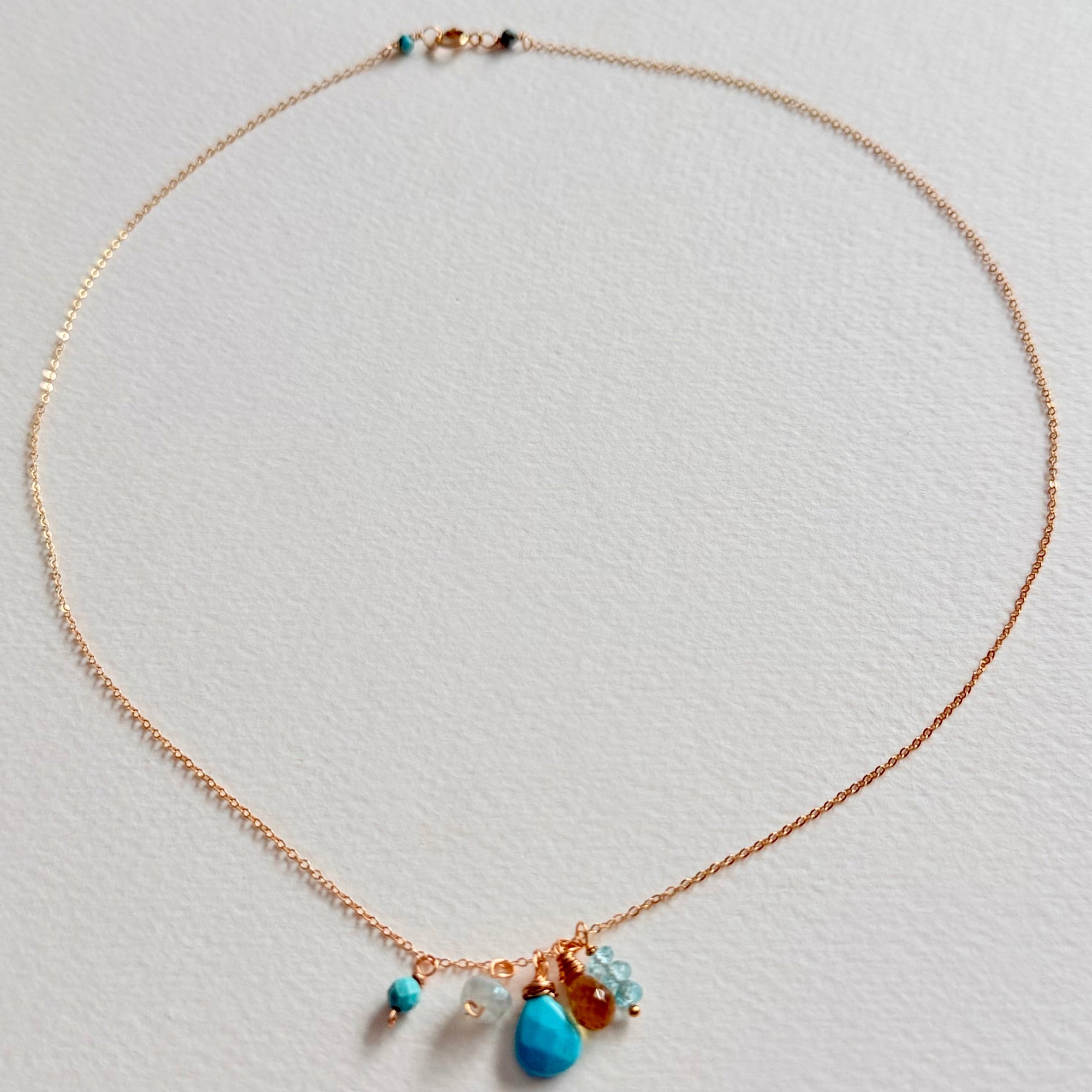 Necklace with colorful beads on a light gray background