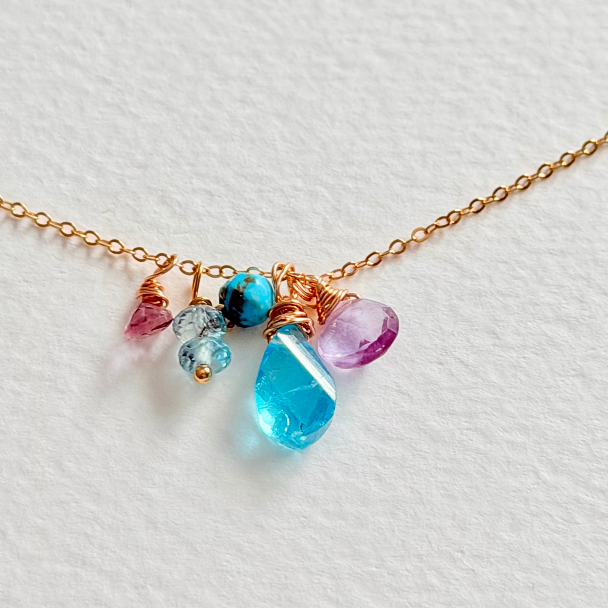 Necklace with colorful beads on a light background