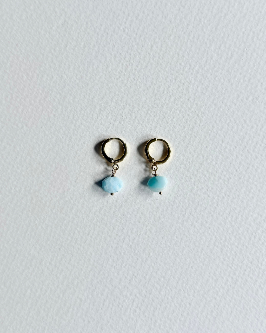 Larimar huggie earrings with blue larimar stones and gold filled hoops