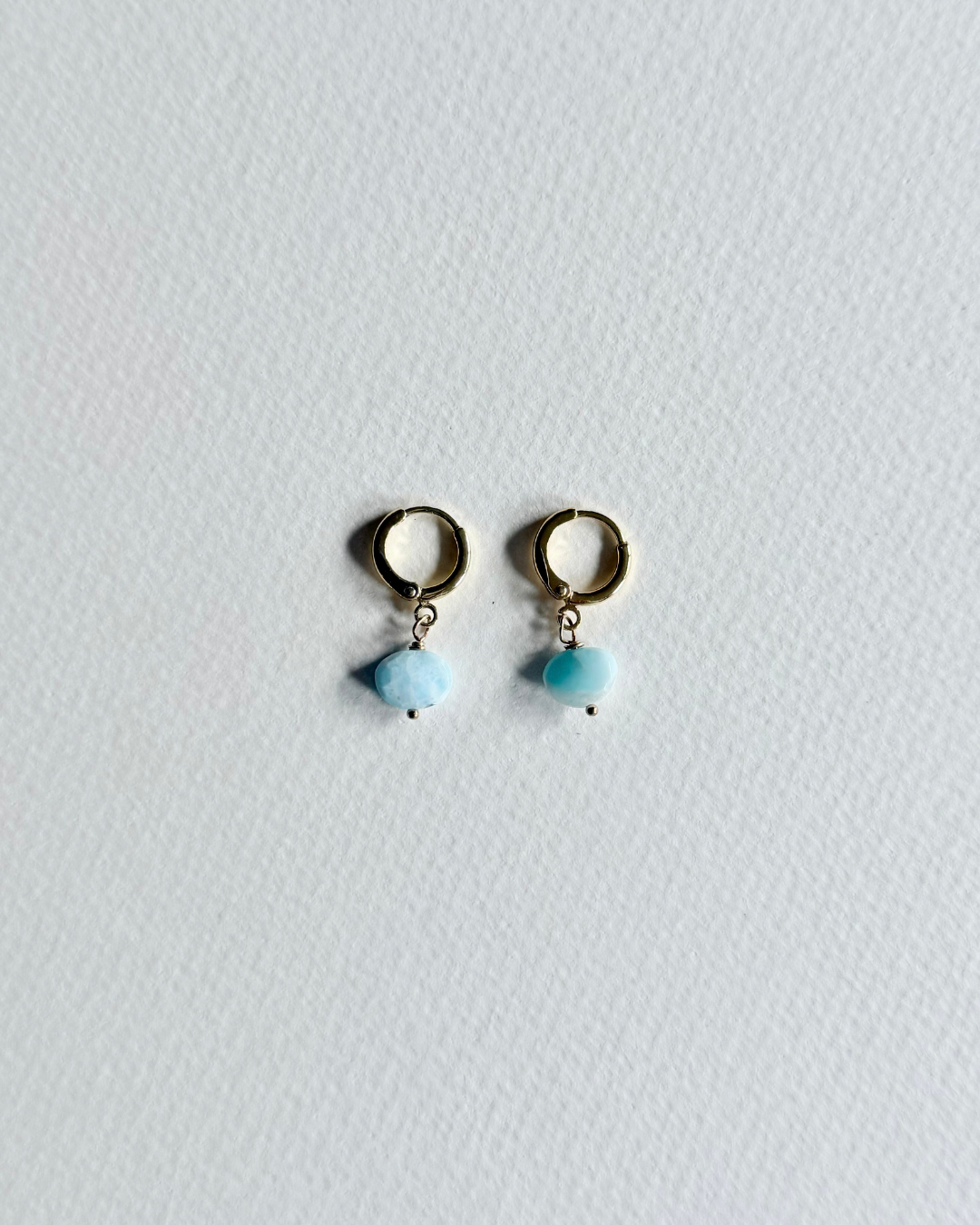 Larimar huggie earrings with blue larimar stones and gold filled hoops
