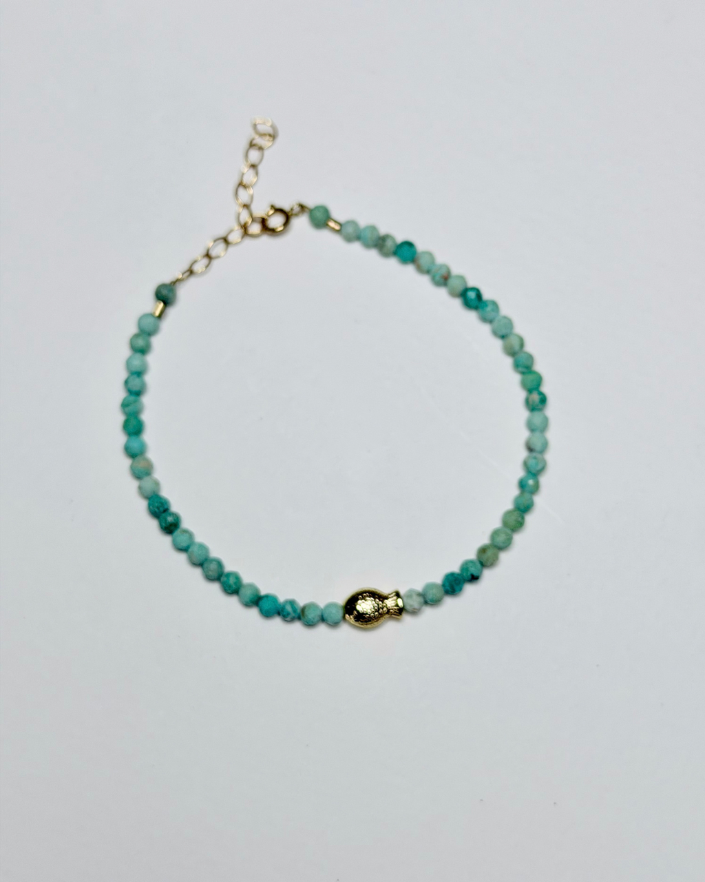 Green turquoise mini fish bracelet with 14k gold-filled details by Marie & Oakley