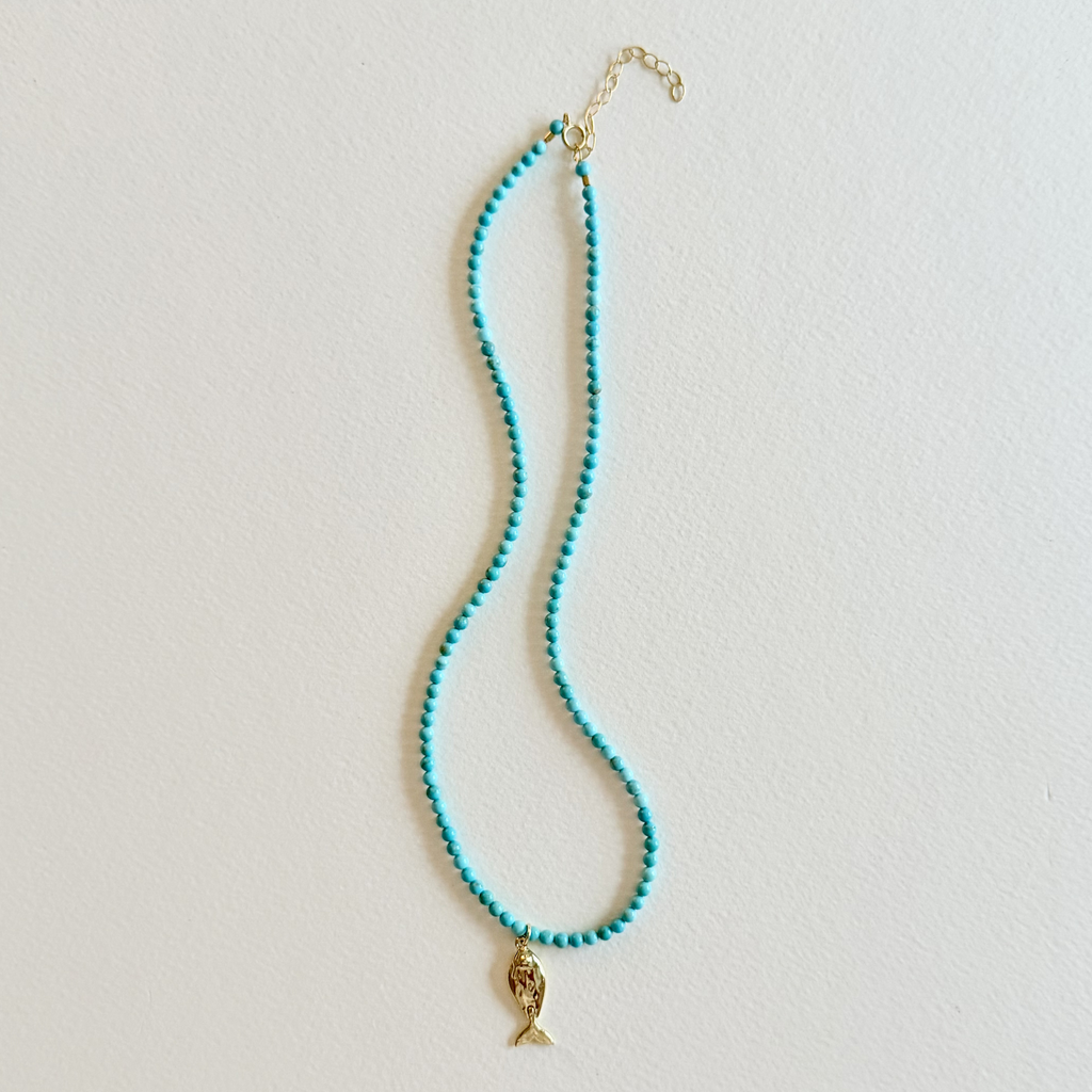 Little Catch Smooth Turquoise Necklace on light background