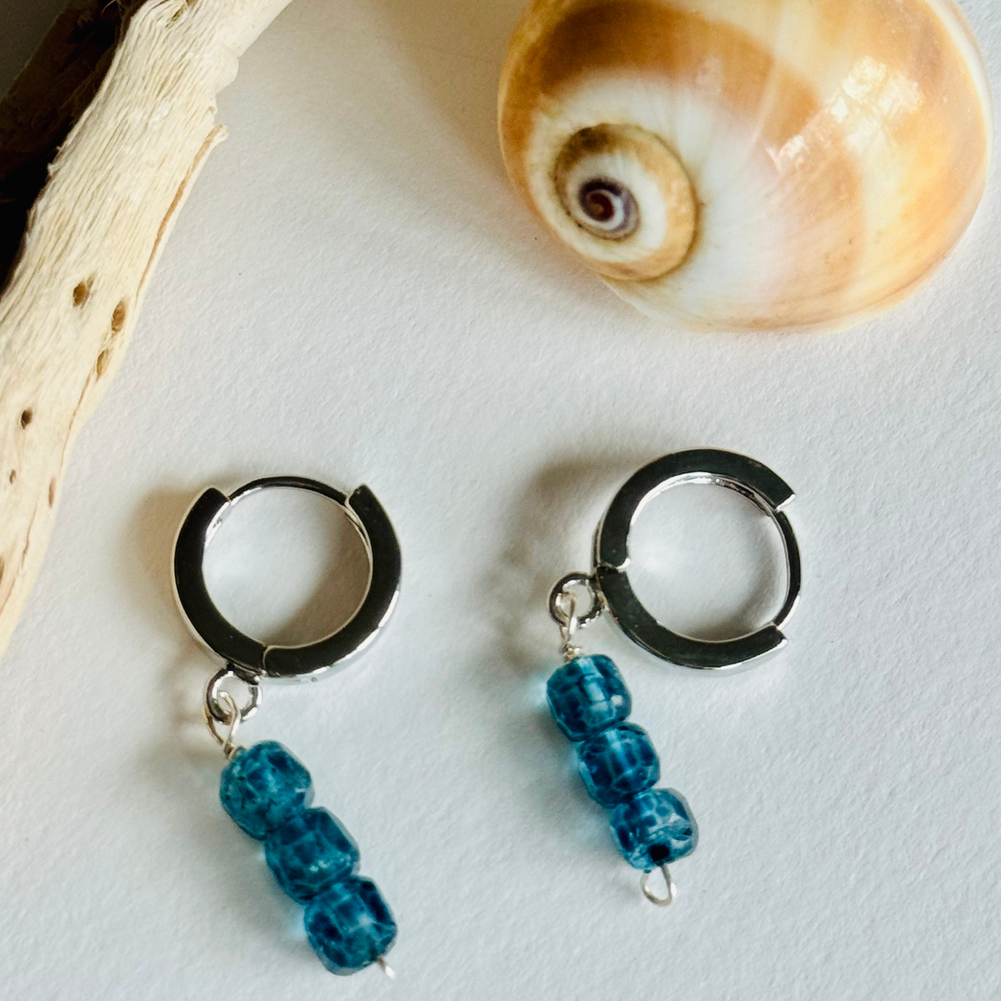 Mystic Blue Topaz Silver Huggie Earrings