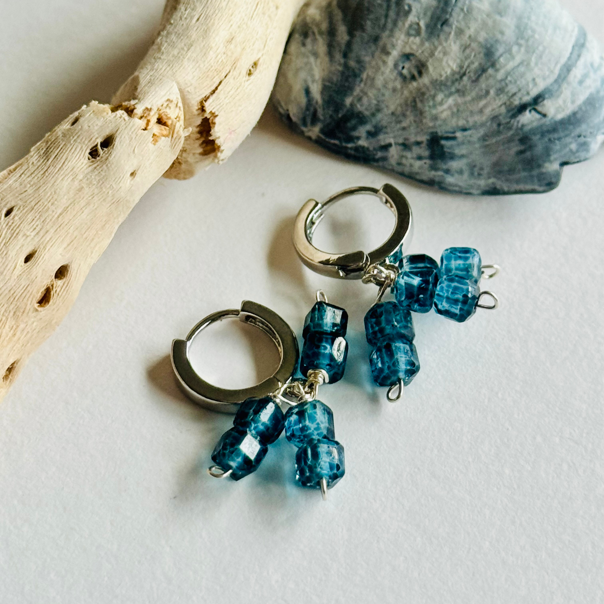 Mystic Blue Topaz Trio Silver Huggie Earrings