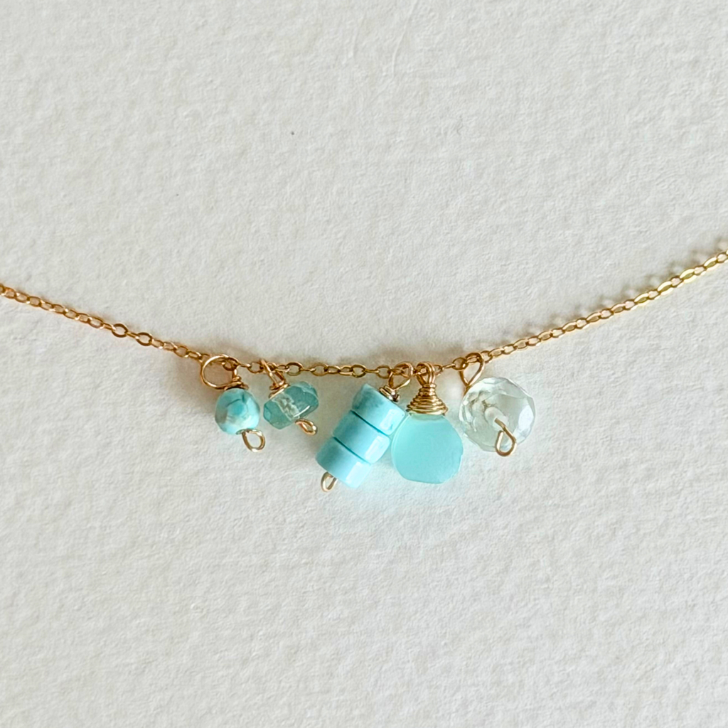 Necklace with turquoise beads on a light background