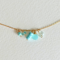 Necklace with turquoise beads on a light background