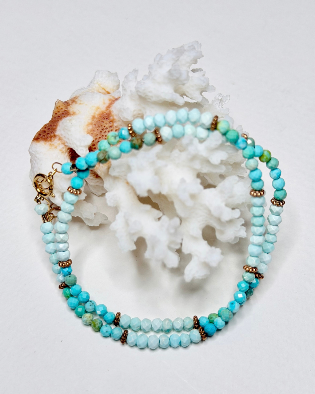 Coastal turquoise wrap bracelet with petite faceted gemstones styled with white coral by Marie & Oakley