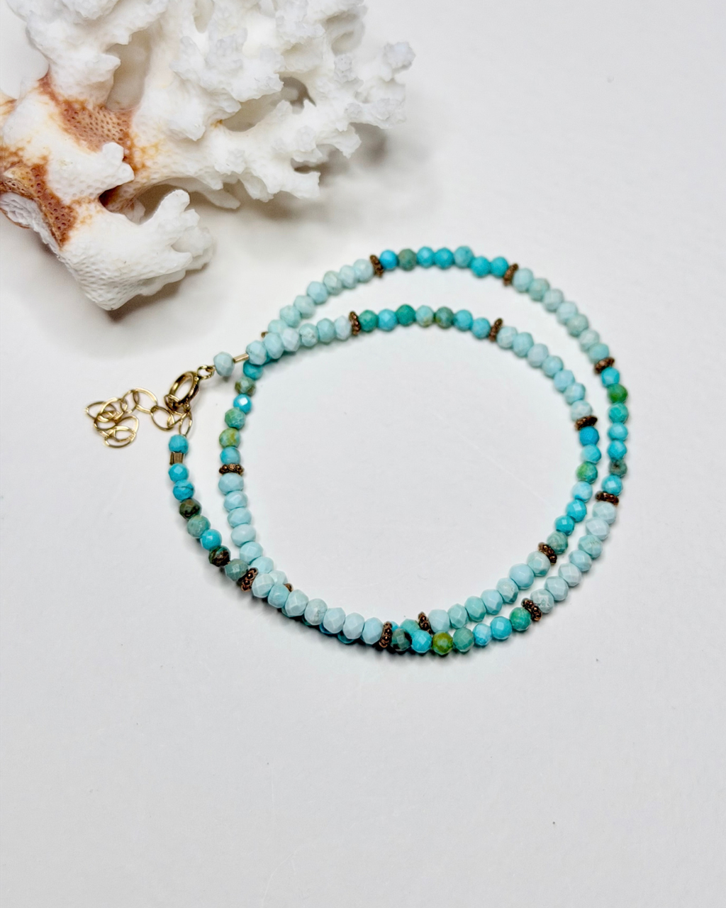 Turquoise wrap bracelet with faceted aqua gemstones and gold-filled details by Marie & Oakley