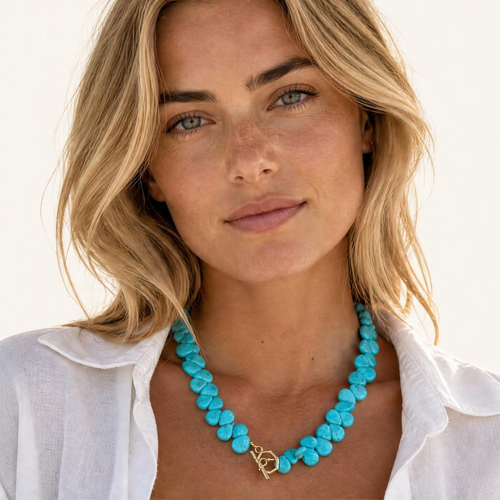 Turquoise Teardrop Necklace on a model wearing the necklace with clasp in front