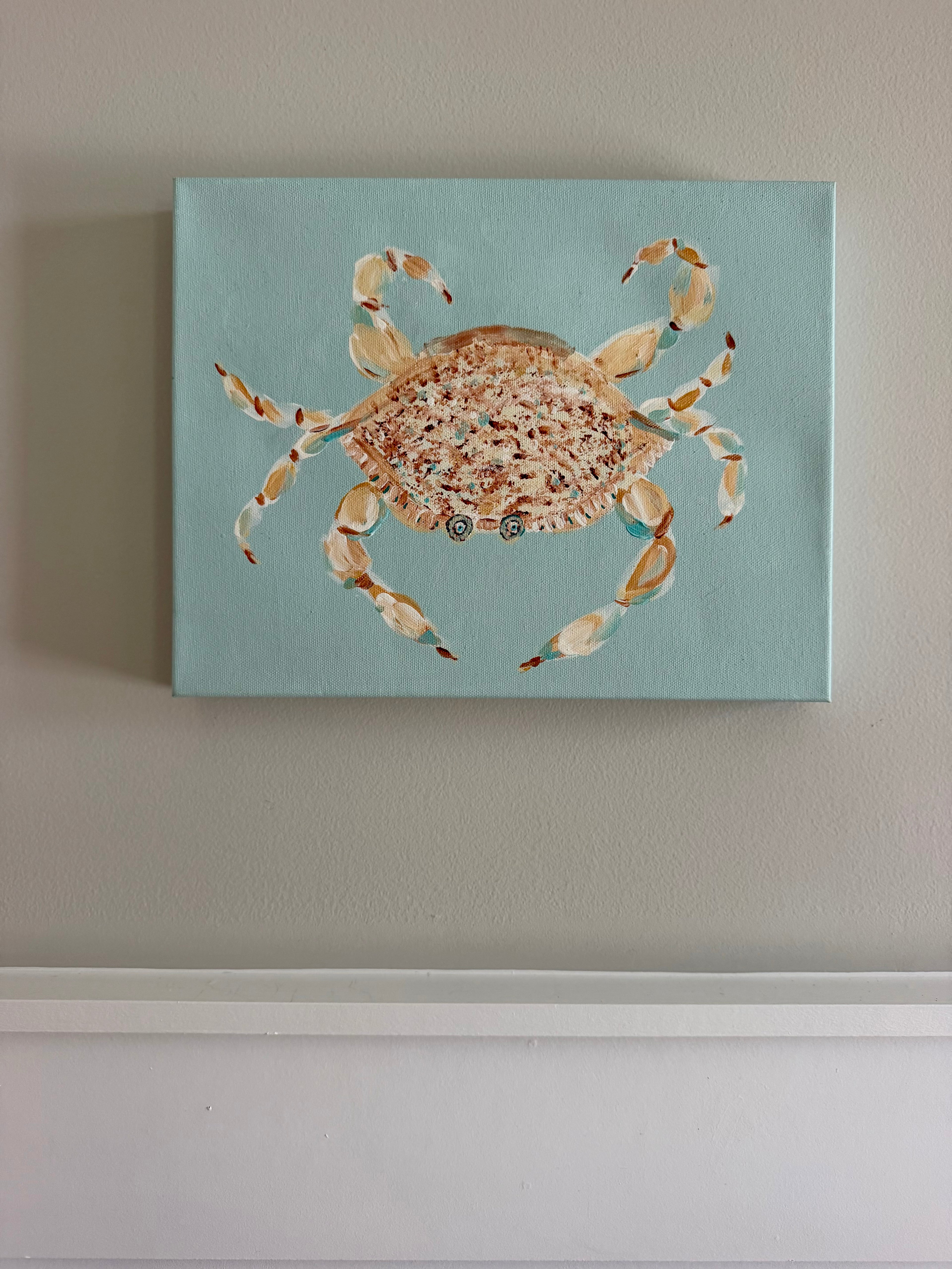 Whimsical blue crab original acrylic painting featuring peach, coral, and cream details against a soft turquoise background.